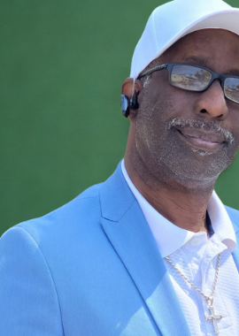 Portrait of Clifford Jarrett in a light blue blazer